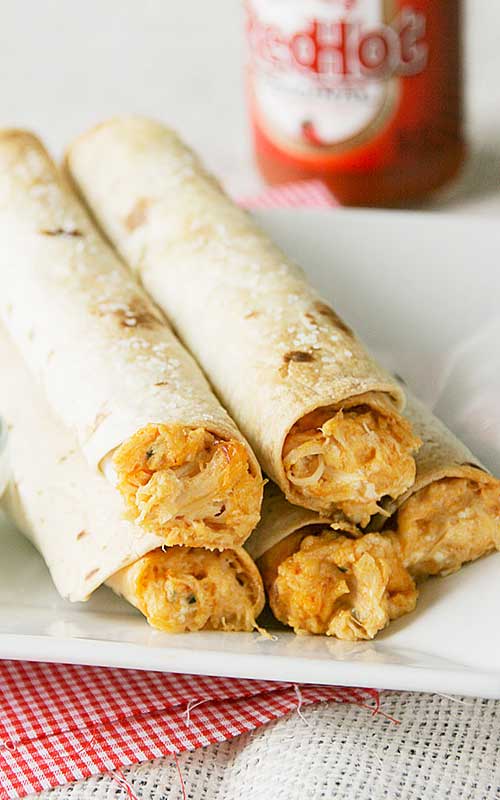 Recipe for Baked Buffalo Chicken Taquitos - Any Buffalo chicken lover will love these Baked Buffalo Chicken Taquitos. Perfect for any party or just a snack!