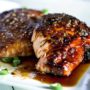 Recipe for Garlic and Miso Glazed Salmon - The easiest, most flavorful salmon you will ever make. Once you cut into your salmon filet you end up with lovely juicy and tender meat. It’s almost like a piece of candy melting in your mouth.