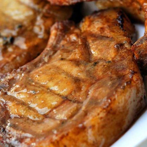 Recipe for Sweet Mustard BBQ Pork Chops - Tender and flavorful grilled pork chops with honey mustard glaze. A quick and easy pork chop recipe packed with savory spices that your guests will love!