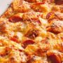 Recipe for Easy Pizza Bake - You won't believe how quickly this pan pizza goes together! And if there's ever a meal that everyone in the family can agree upon, it's pizza.