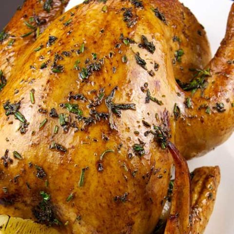 Recipe for Copycat Olive Garden Herb Roasted Chicken - This herb roasted chicken comes out perfectly moist and tender. Every bite is full of fresh vibrant flavors of rosemary, sage, thyme and lemon.
