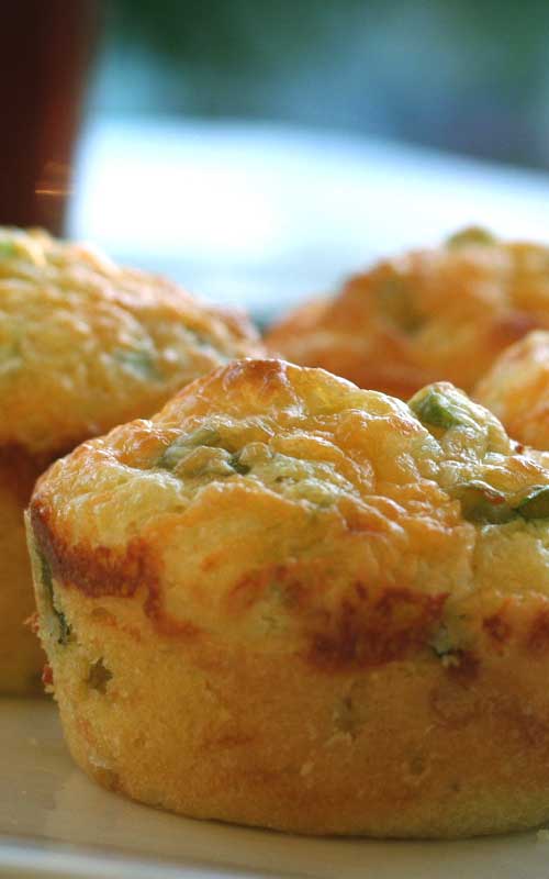 The only thing better than cornbread is cornbread with the cheese baked in! This Cheddar and Green Onion Cornbread Muffins recipe shows you how to make your own.