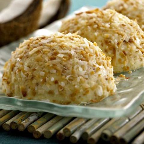 Recipe for Coconut Bavarians - The distinctive taste of coconut combined with the delicate flavor and rich, velvety texture of Crème Fraîche to create a bite sized sweet treat.