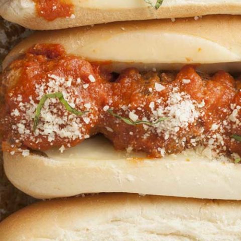 Recipe for Toasted Meatball Subs - Loaded with meatballs and topped with fresh mozzarella and basil, these family-friendly subs are ready in 30 minutes, start to finish!