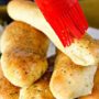 Recipe for Garlic Butter Breadsticks - These irresistible and simple Garlic Butter Breadsticks are so light, airy, and crispy, that you will be BEGGED to make them over and over again!