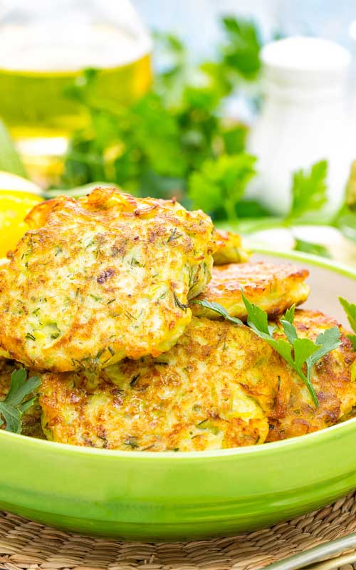 Recipe for Zucchini Pancakes - Made with zucchini, these zucchini pancakes are a tasty change of pace from ordinary potato pancakes. Kick them up a bit by adding a little shredded onion to make them even more savory.