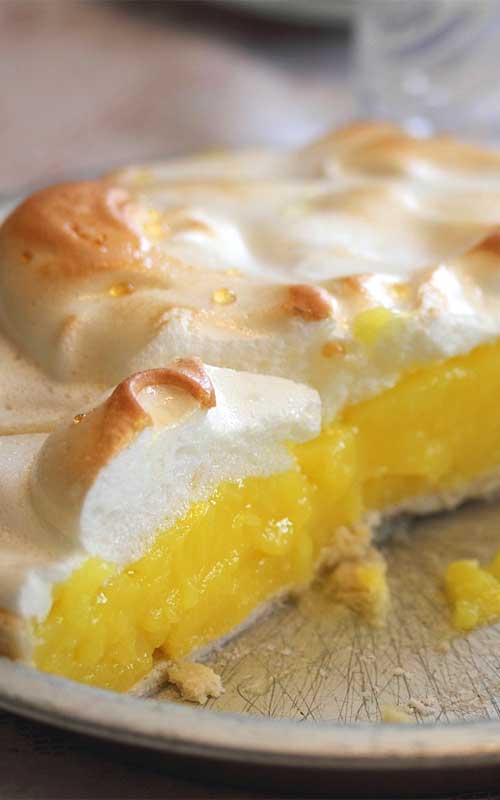 This lemon meringue pie is bursting with fresh lemon taste and a sweet, creamy real meringue topping.This is an old family recipe being passed down from Grandma to a new generation.