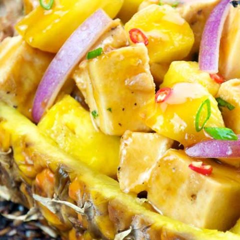 A quick and healthy chicken dish that will take your kitchen table to the islands with it's sweet and spicy flavors. Serve this spicy pineapple chicken over rice for an easy, delicious, and healthy meal!