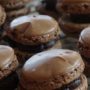 Whip up a batch of these French Chocolate Macarons and pretend that you are taking a trip to Paris. You will fall in love with these crisp chocolate cookies and their luscious creamy ganache filling.